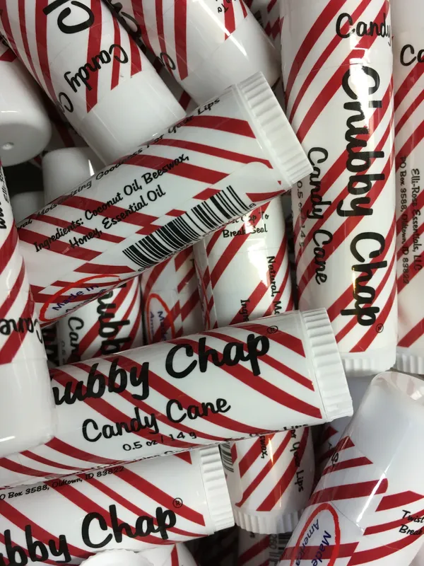 A pile of candy canes that are in the shape of words.