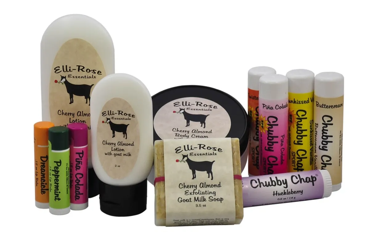 A group of products that include lip balms, soap and lotion.